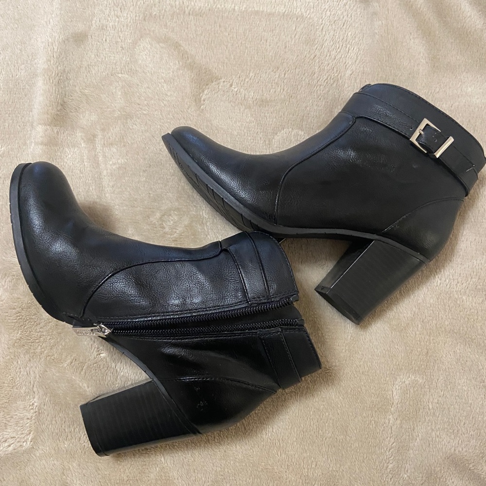 Black booties with silver buckle